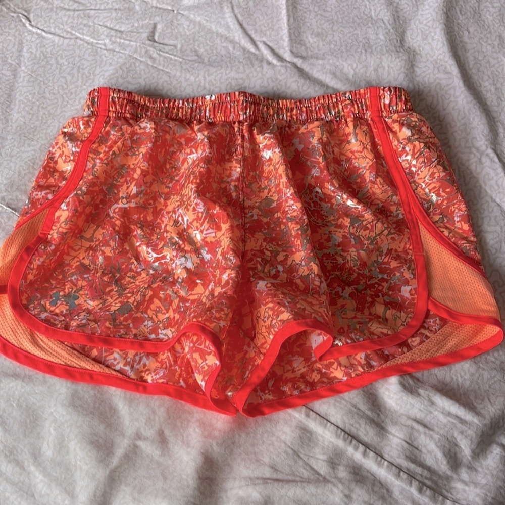 Under Armour girls Heat Gear orange and gold athletic shorts in size small